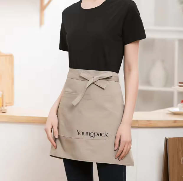 Delantal impermeable de uniforme de camarero con estampado de dibujos animados, para limpiarse las manos, con logotipo personalizado, para cocina y hogar, venta al por mayor