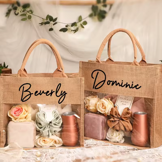 Bolsas de regalo de boda portátiles con logotipo impreso personalizado al por mayor, de arpillera, de yute, de lino, con asa de cuerda de algodón y ventana transparente.