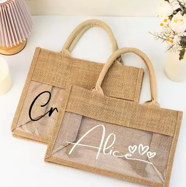 Bolsas de regalo de boda portátiles con logotipo impreso personalizado al por mayor, de arpillera, de yute, de lino, con asa de cuerda de algodón y ventana transparente.