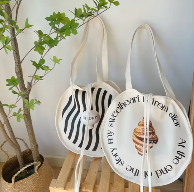 Bolso de compras de lona retro literario con logotipo personalizado para mujer, moderno bolso de mano francés de un solo hombro.